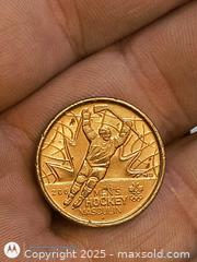 MaxSold Auction: Mens Hockey Coin  - Kingston (Ontario, Canada) SELLER MANAGED Downsizing Online Auction - Railway Street