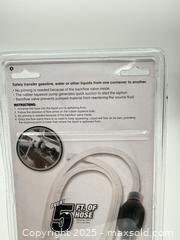 MaxSold Auction: Performance Tool Fluid Siphon Pump Over 5’ Of Hose  - Norfolk (Ontario, Canada) SELLER MANAGED Commercial Liquidation Online Auction - Robinson Street