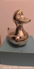 MaxSold Auction: Vintage Chrome-Plated Duck Coin Bank Made in Japan - Kingston (Ontario, Canada) SELLER MANAGED Downsizing Online Auction -  Sydenham Street