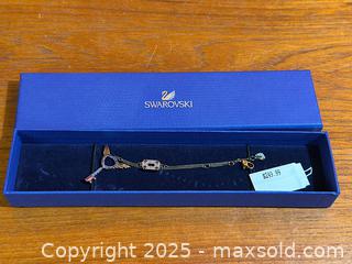 MaxSold Auction: Swarovski Crystal Key Pendant and Bracelet LNWT - Hamilton (Ontario, Canada) SELLER MANAGED Estate Sale Online Auction - Gertrude Street