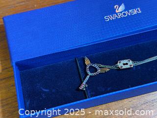 MaxSold Auction: Swarovski Crystal Key Pendant and Bracelet LNWT - Hamilton (Ontario, Canada) SELLER MANAGED Estate Sale Online Auction - Gertrude Street