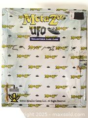 MaxSold Auction: MetaZoo UFO Booster Box 1st Edition (2022) - Cobourg (Ontario, Canada) SELLER MANAGED Reseller Online Auction - Elgin Street West