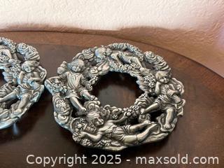 MaxSold Auction: Vintage Aluminum Cherubs Angels Flowers Trivets  - San Francisco (California, USA) SELLER MANAGED Estate Sale Online Auction - Kenwood Way