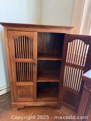 MaxSold Auction: Vintage Indonesian Teak Spindle Front Cabinet - San Francisco (California, USA) SELLER MANAGED Estate Sale Online Auction - Kenwood Way