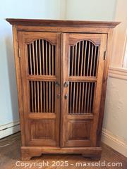 MaxSold Auction: Vintage Indonesian Teak Spindle Front Cabinet - San Francisco (California, USA) SELLER MANAGED Estate Sale Online Auction - Kenwood Way