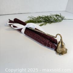 MaxSold Auction: Etched brass, twisted handle candle snuffer with burgundy beeswax candles - Toronto (Ontario, Canada) SELLER MANAGED Reseller Online Auction - Greengrove Crescent
