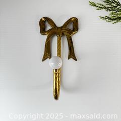MaxSold Auction: Vintage brass Christmas bow hook - Toronto (Ontario, Canada) SELLER MANAGED Reseller Online Auction - Greengrove Crescent