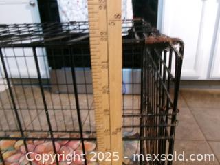 MaxSold Auction: Metal dog crate with pad - Covington (Georgia, USA) SELLER MANAGED Downsizing Online Auction - Queensland Lane