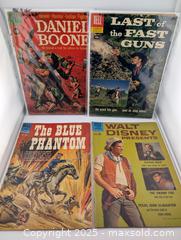 MaxSold Auction: 1950/60s Wild West & Cowboys Dell Comic Book Collection incl 4 Colors & a Paul Newman Cover (13 Total)  - Langley (British Columbia, Canada) SELLER MANAGED Reseller Online Auction - 68 Avenue