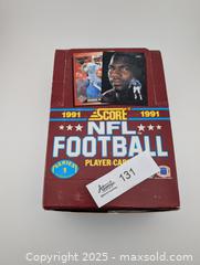 MaxSold Auction: 1991 NFL Score Football Sealed Packs x36 - Langley (British Columbia, Canada) SELLER MANAGED Reseller Online Auction - 68 Avenue