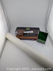 MaxSold Auction: Batman Classic TV Series Batmobile Batman Diecast, 1995 Holographic Fleer &#38; 1982 Batman Lithograph Poster (DC Comics) - Langley (British Columbia, Canada) SELLER MANAGED Reseller Online Auction - 68 Avenue