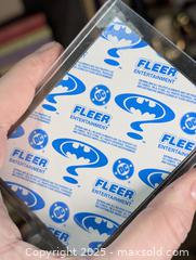 MaxSold Auction: Batman Classic TV Series Batmobile Batman Diecast, 1995 Holographic Fleer &#38; 1982 Batman Lithograph Poster (DC Comics) - Langley (British Columbia, Canada) SELLER MANAGED Reseller Online Auction - 68 Avenue