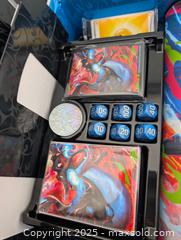 MaxSold Auction: Charizard UPC Contents (No packs or Promo Cards)  - Langley (British Columbia, Canada) SELLER MANAGED Reseller Online Auction - 68 Avenue