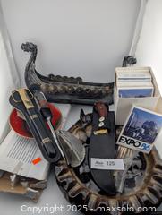 MaxSold Auction: Mixed Lot of Collectibles: Viking Ship, Letter Openers, Knives, Bear Paw Ashtray & More - Langley (British Columbia, Canada) SELLER MANAGED Reseller Online Auction - 68 Avenue