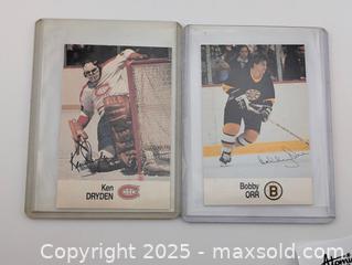 MaxSold Auction: NHL Hockey 4 Card Lot: Vintage Ken Dryden, Bobby Orr & rare Santa cards - Langley (British Columbia, Canada) SELLER MANAGED Reseller Online Auction - 68 Avenue