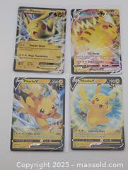 MaxSold Auction: Pikachu Card Collection (4 total) Pokemon TCG  - Langley (British Columbia, Canada) SELLER MANAGED Reseller Online Auction - 68 Avenue