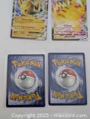 MaxSold Auction: Pikachu Card Collection (4 total) Pokemon TCG  - Langley (British Columbia, Canada) SELLER MANAGED Reseller Online Auction - 68 Avenue