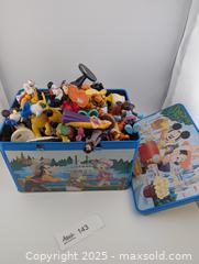 MaxSold Auction: Tin of Mini Disney Figurine Characters - Langley (British Columbia, Canada) SELLER MANAGED Reseller Online Auction - 68 Avenue