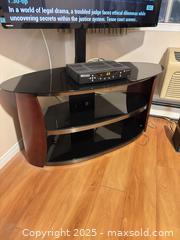 MaxSold Auction: Tv stand with attached tv mounting hardware - Kingston (Ontario, Canada) SELLER MANAGED Estate Sale Online Auction -  Norwest Road