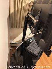 MaxSold Auction: Tv stand with attached tv mounting hardware - Kingston (Ontario, Canada) SELLER MANAGED Estate Sale Online Auction -  Norwest Road