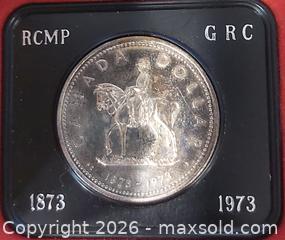 MaxSold Auction: 1973 Canada RCMP Commemorative Silver Dollar - Barrie (Ontario, Canada) SELLER MANAGED Downsizing Online Auction - Oakley Park Square