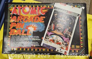 MaxSold Auction: Tomy (Parker) Atomic Arcade Portable Tabletop Pinball -  Kingston (Ontario, Canada) PARTNER MANAGED Downsizing Online Auction - Steve Fonyo Drive  (STORAGE)