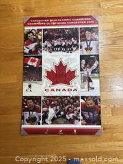 MaxSold Auction: 2010 Team Canada Olympic hockey poster on plaque board  - Kingston (Ontario, Canada) SELLER MANAGED Downsizing Online Auction -  Juniper Drive