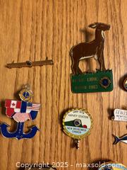 MaxSold Auction: 8 Lions Club collectors pins  - Kingston (Ontario, Canada) SELLER MANAGED Downsizing Online Auction -  Juniper Drive