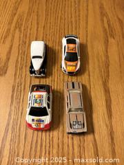 MaxSold Auction: Lot of 4 toy cars - Kingston (Ontario, Canada) SELLER MANAGED Downsizing Online Auction -  Juniper Drive