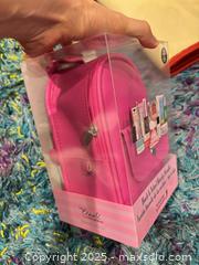 MaxSold Auction: Backpack Bundle Of Makeup & Skincare - Toronto (Ontario, Canada) SELLER MANAGED Downsizing Online Auction - Byron Avenue