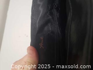 MaxSold Auction: Black duffle bag - Ottawa (Ontario, Canada) SHORT NOTICE SELLER MANAGED Downsizing Online Auction - Van Lang Private (CONDO)