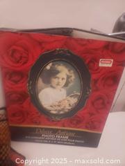 MaxSold Auction: Brand-new picture frame and handbag - Ottawa (Ontario, Canada) SHORT NOTICE SELLER MANAGED Downsizing Online Auction - Van Lang Private (CONDO)