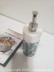 MaxSold Auction: Dvd and soap holder - Ottawa (Ontario, Canada) SHORT NOTICE SELLER MANAGED Downsizing Online Auction - Van Lang Private (CONDO)