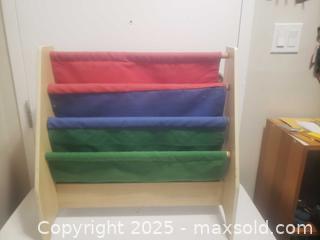 MaxSold Auction: Kids book holder - Ottawa (Ontario, Canada) SHORT NOTICE SELLER MANAGED Downsizing Online Auction - Van Lang Private (CONDO)