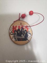MaxSold Auction: Kiss ornament  - Ottawa (Ontario, Canada) SHORT NOTICE SELLER MANAGED Downsizing Online Auction - Van Lang Private (CONDO)