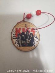 MaxSold Auction: Kiss ornament  - Ottawa (Ontario, Canada) SHORT NOTICE SELLER MANAGED Downsizing Online Auction - Van Lang Private (CONDO)