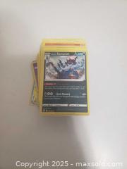MaxSold Auction: Pokemon cards - Ottawa (Ontario, Canada) SHORT NOTICE SELLER MANAGED Downsizing Online Auction - Van Lang Private (CONDO)