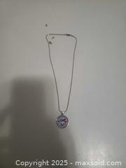 MaxSold Auction: Stainless still necklace blue jays - Ottawa (Ontario, Canada) SHORT NOTICE SELLER MANAGED Downsizing Online Auction - Van Lang Private (CONDO)