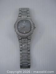 MaxSold Auction: Old NOS Pintime Quartz Wristwatch w/ Big Face & Silver Stainless Steel Band w/ Crystal Diamonds - Esquimalt (British Columbia, Canada) SELLER MANAGED Downsizing Online Auction - Yarrow Place