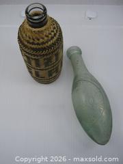 MaxSold Auction: Old Torpedo Bottle & Laos Rice Grain Whiskey Bottle - Esquimalt (British Columbia, Canada) SELLER MANAGED Downsizing Online Auction - Yarrow Place