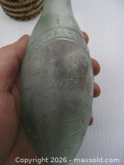 MaxSold Auction: Old Torpedo Bottle & Laos Rice Grain Whiskey Bottle - Esquimalt (British Columbia, Canada) SELLER MANAGED Downsizing Online Auction - Yarrow Place