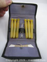 MaxSold Auction: Old Travel Clothesline & Peg Set w/ Original Leather Case - Esquimalt (British Columbia, Canada) SELLER MANAGED Downsizing Online Auction - Yarrow Place