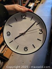 MaxSold Auction: Modern Minimalist Wall Clock, 11–13 in (28–33 cm) Diameter - Kingston (Ontario, Canada) SELLER MANAGED Downsizing Online Auction - Development Drive (STORAGE)