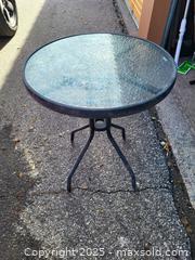 MaxSold Auction: Outdoor Round Bistro Patio Table with Textured Glass Top - Kingston (Ontario, Canada) SELLER MANAGED Downsizing Online Auction - Development Drive (STORAGE)
