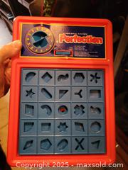 MaxSold Auction: Perfection Timed Shape-Matching Puzzle Game by Milton Bradley - Kingston (Ontario, Canada) SELLER MANAGED Downsizing Online Auction - Development Drive (STORAGE)