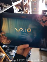MaxSold Auction: Sony VAIO 15.6&#34; Laptop Blue with Floral Accents - Kingston (Ontario, Canada) SELLER MANAGED Downsizing Online Auction - Development Drive (STORAGE)