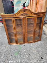 MaxSold Auction: Wall-Mounted Curio Display Cabinet, Medium Oak, Four Glass Doors - Kingston (Ontario, Canada) SELLER MANAGED Downsizing Online Auction - Development Drive (STORAGE)