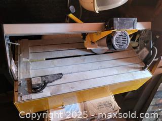 MaxSold Auction: Wet Tile Saw / Table Tile Cutter (Unknown Brand) - Kingston (Ontario, Canada) SELLER MANAGED Downsizing Online Auction - Development Drive (STORAGE)