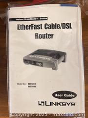 MaxSold Auction: Linksys BEFSR11 EtherFast 10/100 Wired Cable/DSL Router - Cobourg (Ontario, Canada) SELLER MANAGED Reseller Online Auction - Spragge Crescent