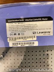 MaxSold Auction: Linksys BEFSR11 EtherFast 10/100 Wired Cable/DSL Router - Cobourg (Ontario, Canada) SELLER MANAGED Reseller Online Auction - Spragge Crescent